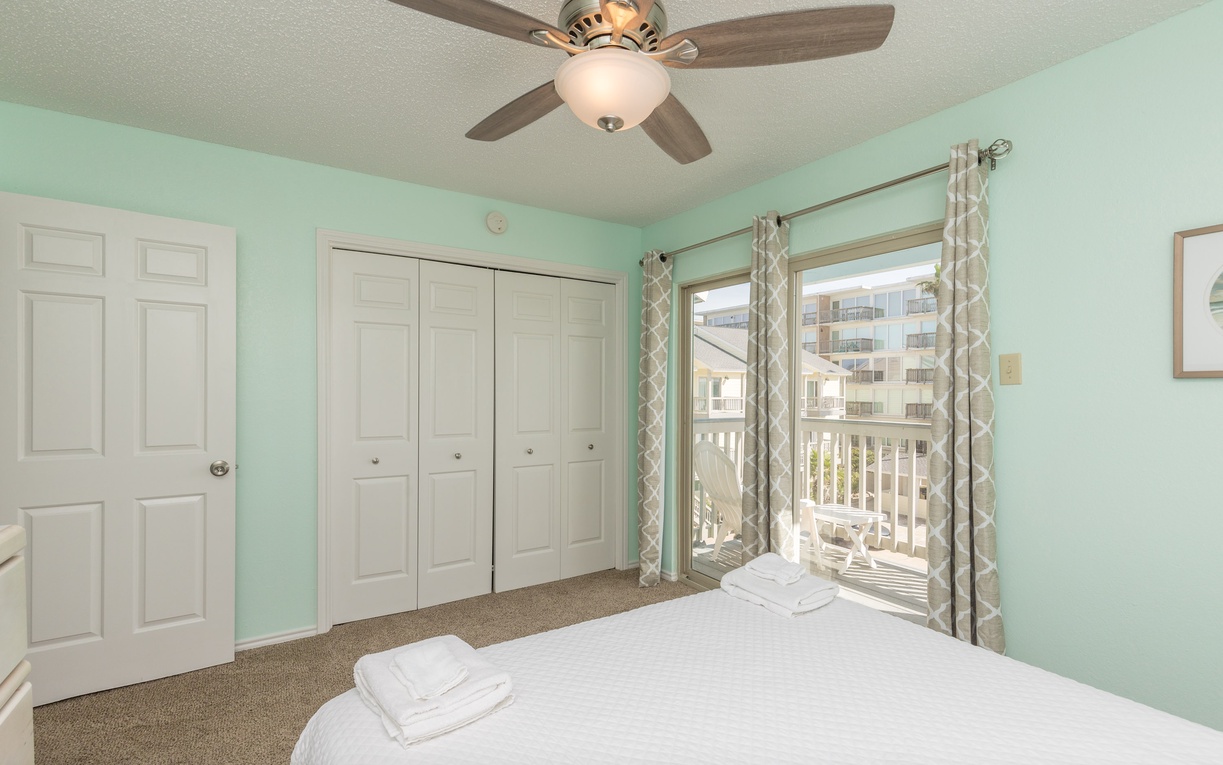 Wake up refreshed in your peaceful bedroom with gentle ceiling fan breezes and queen size bed.