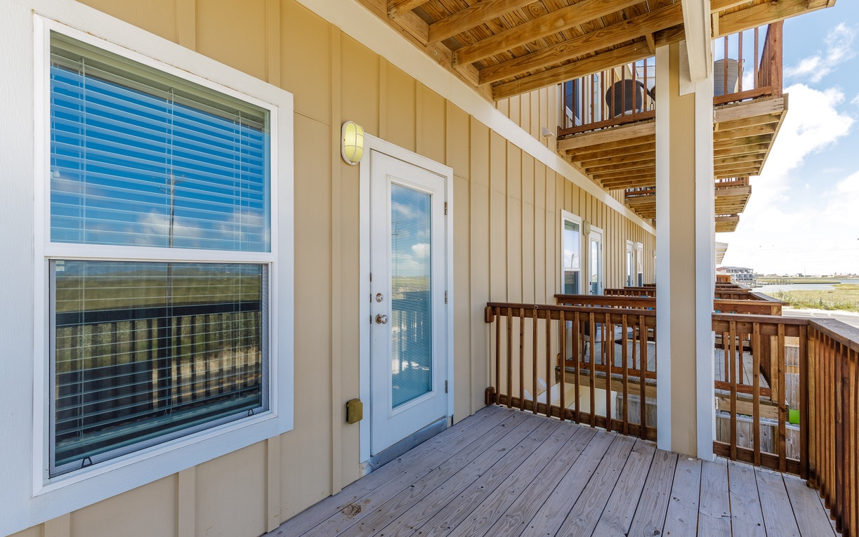 Your private balcony invites peaceful moments with coastal breezes and serene views stretching across the horizon.