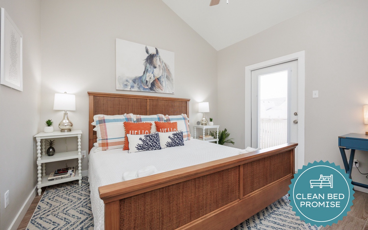 Drift into peaceful slumber in your stylish bedroom featuring coastal touches and crisp, clean linens.