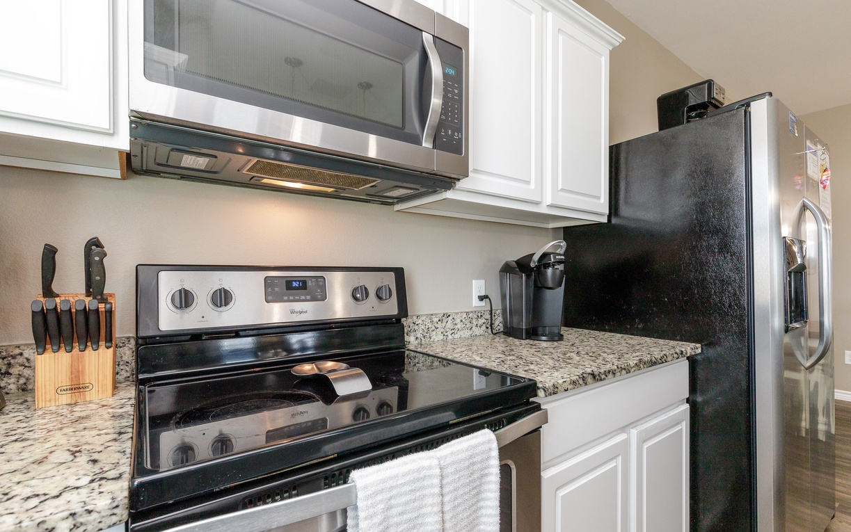 Your fully equipped kitchen features granite countertops, stainless steel appliances, and everything you need to create delicious meals during your stay.