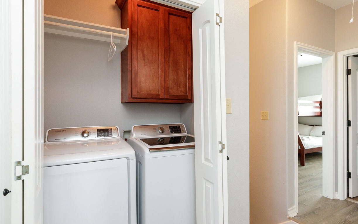 Your dedicated laundry space keeps your vacation wardrobe fresh with full-size washer and dryer plus ample storage.