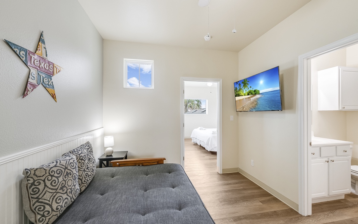Relax on your comfortable sofa while enjoying the flat-screen TV, with cozy bedrooms and kitchen just steps away for ultimate convenience.
