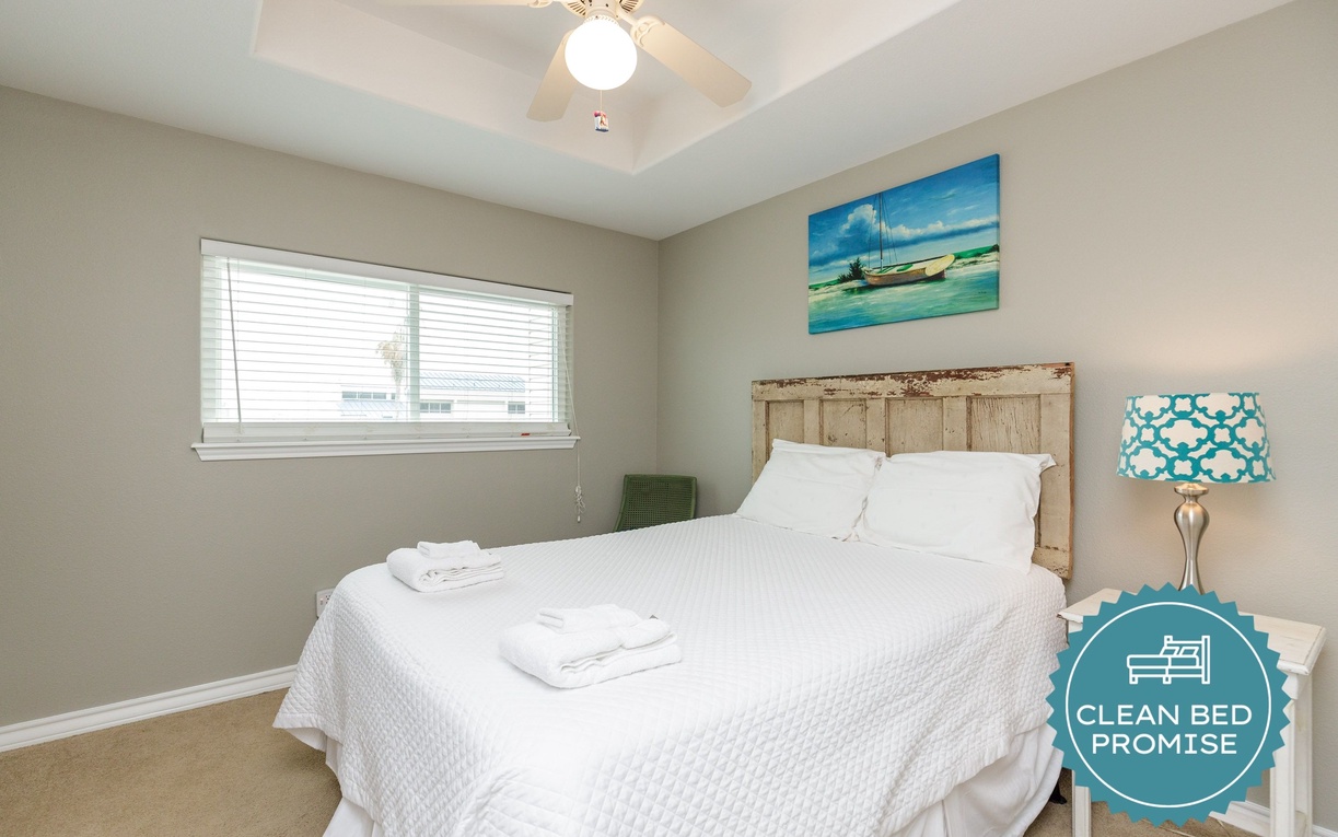 Drift off to sleep under your coastal-themed decor and ceiling fan. Fresh linens await your arrival.