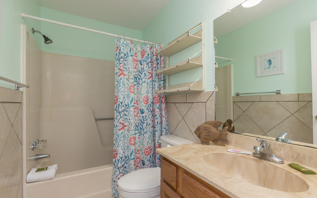 Second floor guest bathroom with tub and shower combo