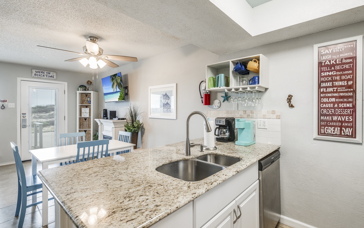 Your fully equipped kitchen features granite counters and everything needed to create vacation memories over home-cooked meals.