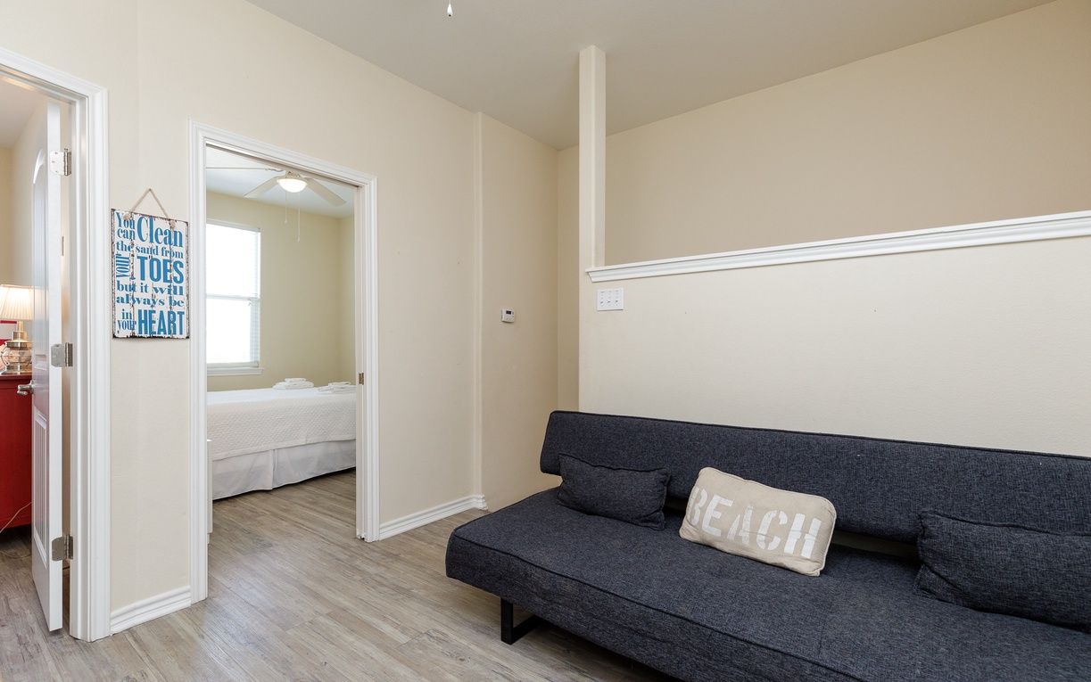 Second floor loft area with full size futon