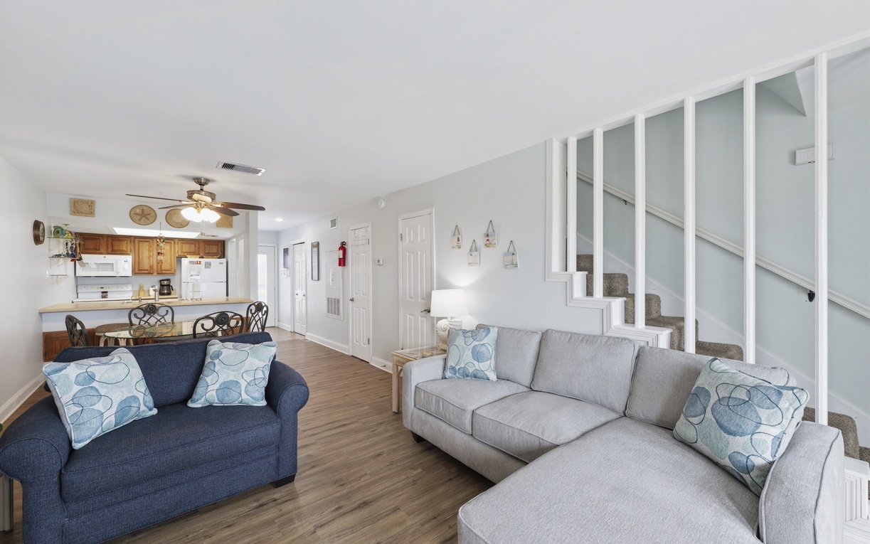 Step into your bright, welcoming retreat with comfortable seating perfect for gathering with loved ones. The open-concept layout connects living, dining, and kitchen spaces for effortless entertaining and relaxation.
