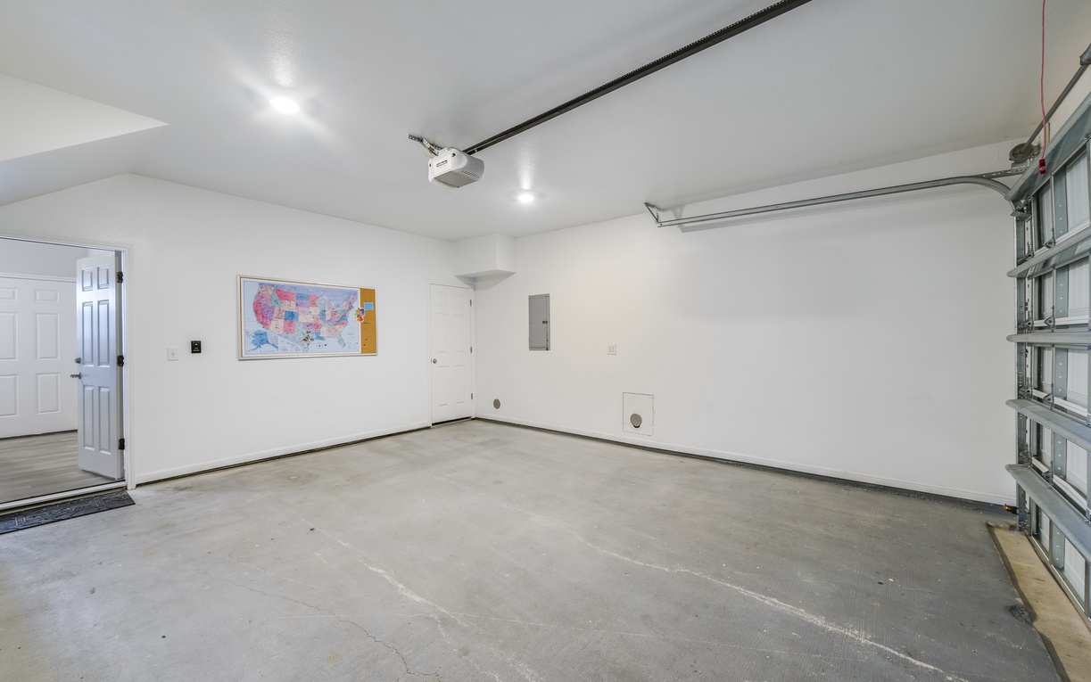 Clean, spacious garage with convenient parking and storage for your rental stay.