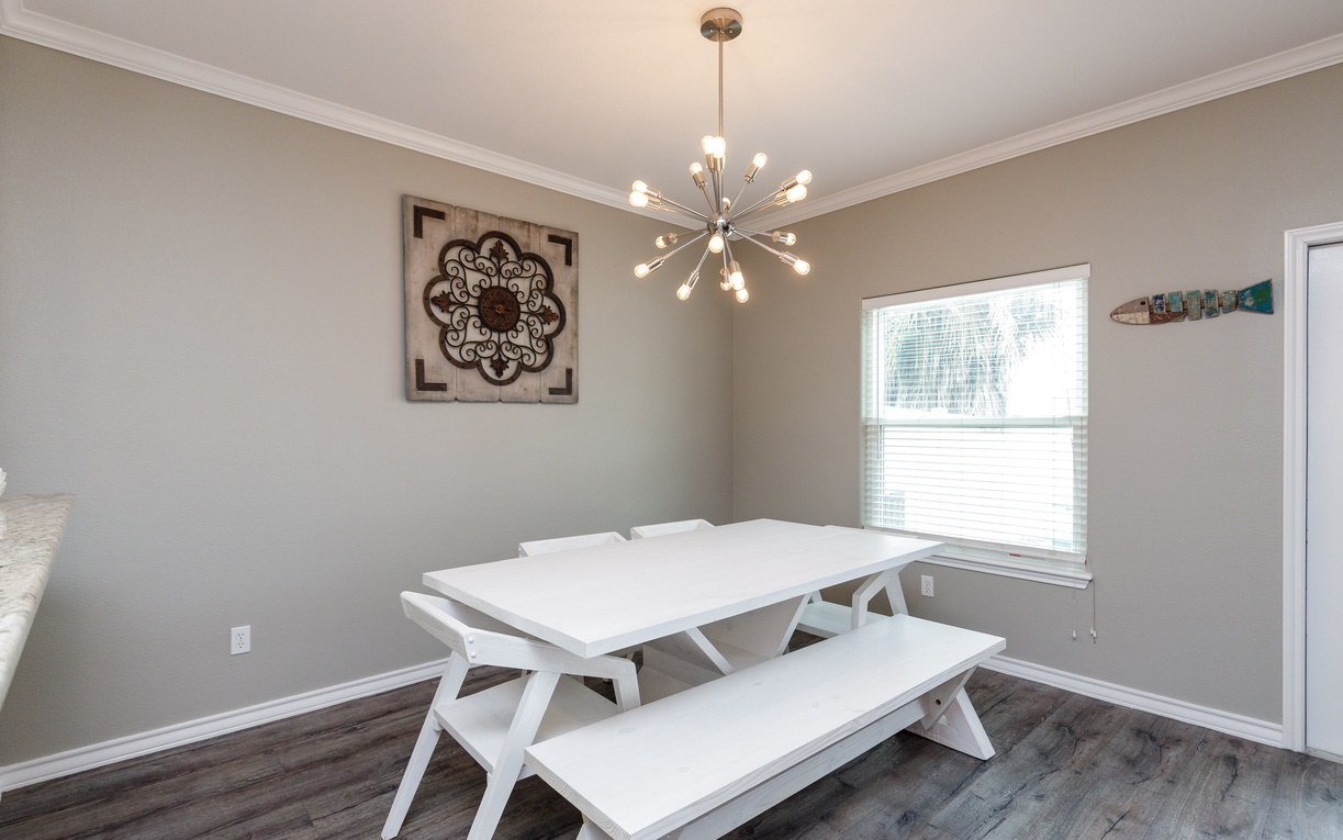 Gather around your bright dining table where modern style meets comfort, perfect for sharing meals and making memories together.