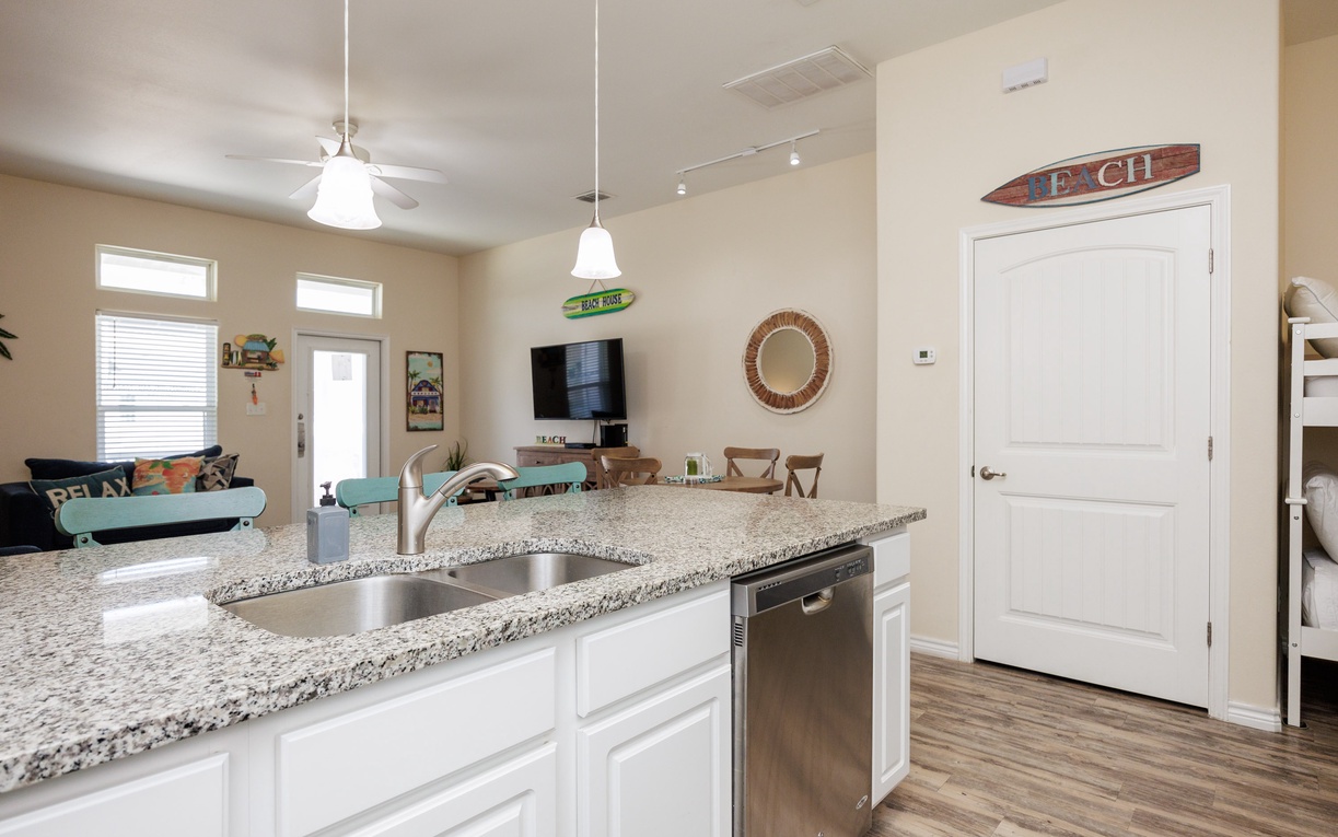 Your open kitchen flows seamlessly into the living space, perfect for preparing meals while staying connected with family and friends.