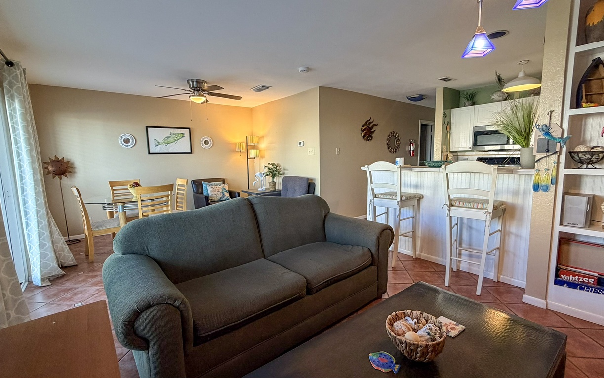 Living space with relaxed seating for the family and a full size sofa bed and twin size fold-out sleeper chair.