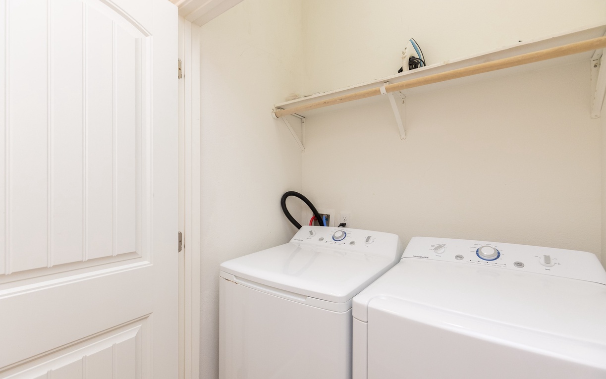 Your dedicated laundry room keeps clothes fresh with full-size washer and dryer, plus convenient storage space for supplies.