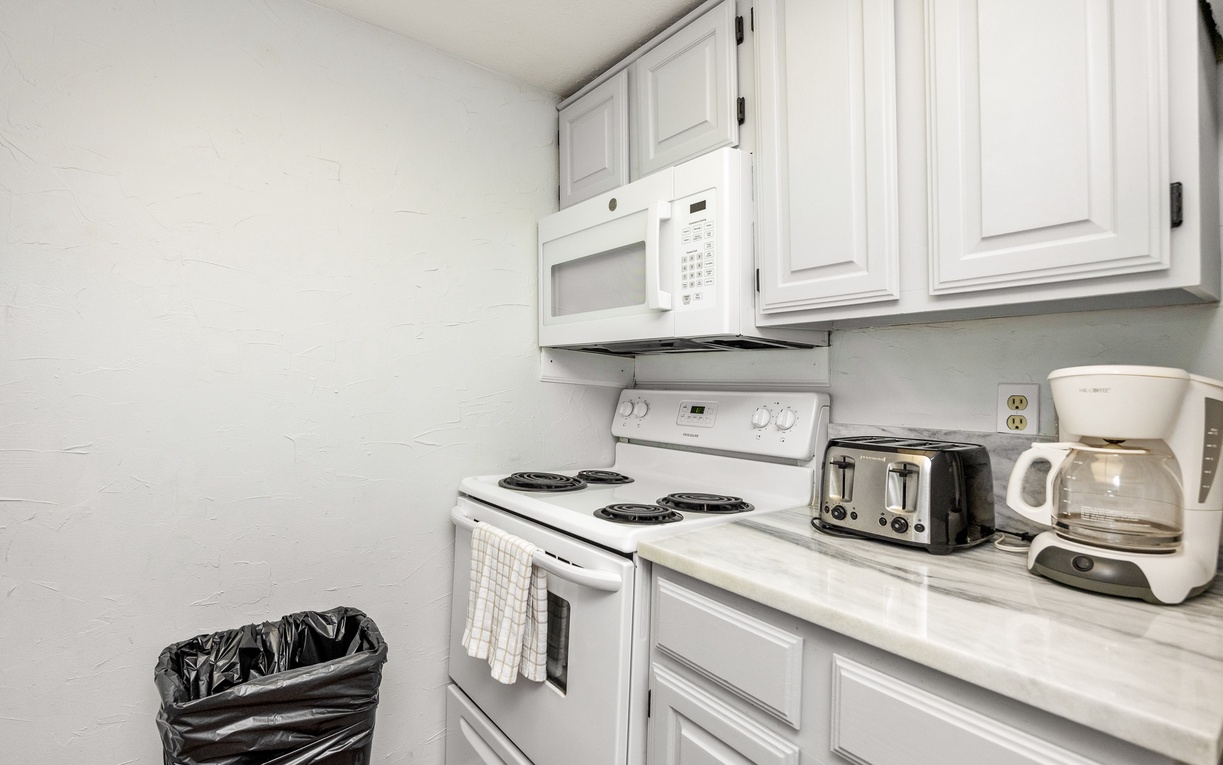 Your fully equipped kitchen features everything needed for home-cooked meals, from morning coffee to family dinners.