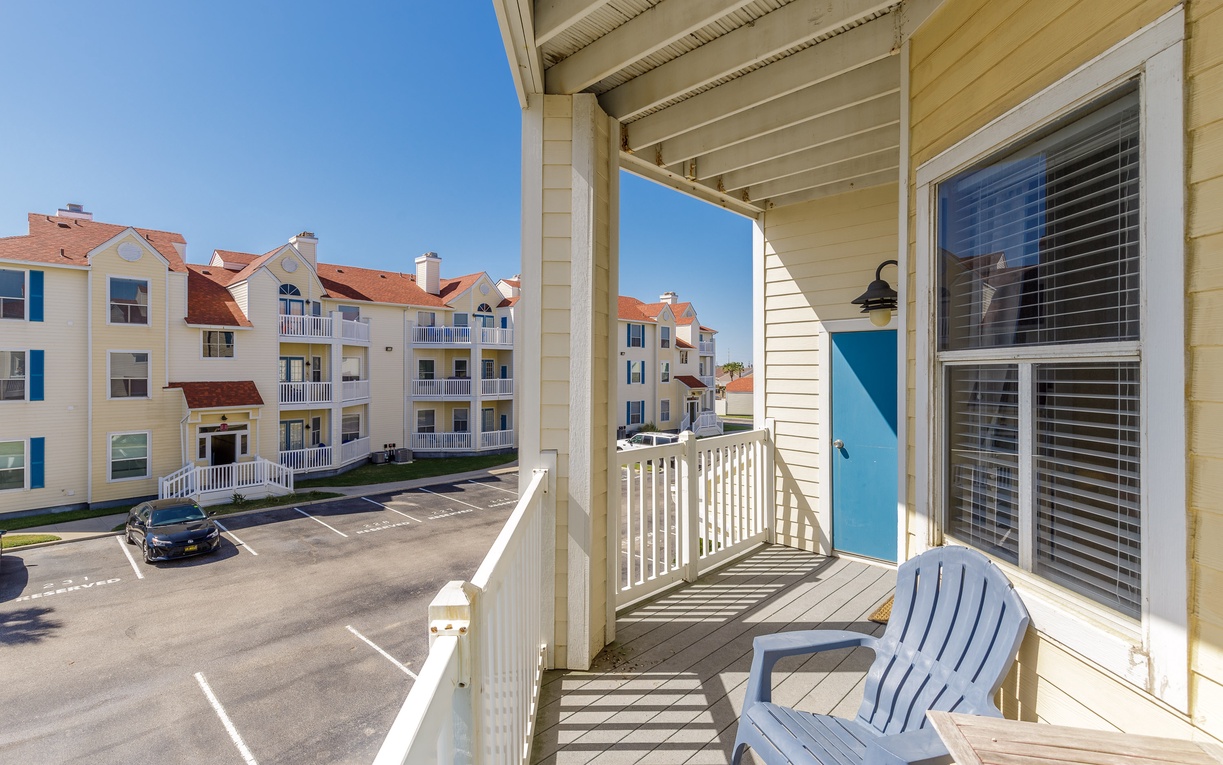 Step onto your private balcony and soak in the peaceful community views while enjoying morning coffee in the comfortable outdoor seating.