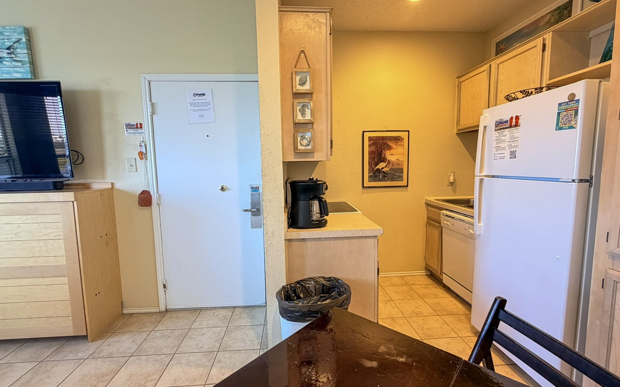 Your fully equipped kitchen awaits with everything needed for home-cooked meals, from morning coffee to family dinners together.