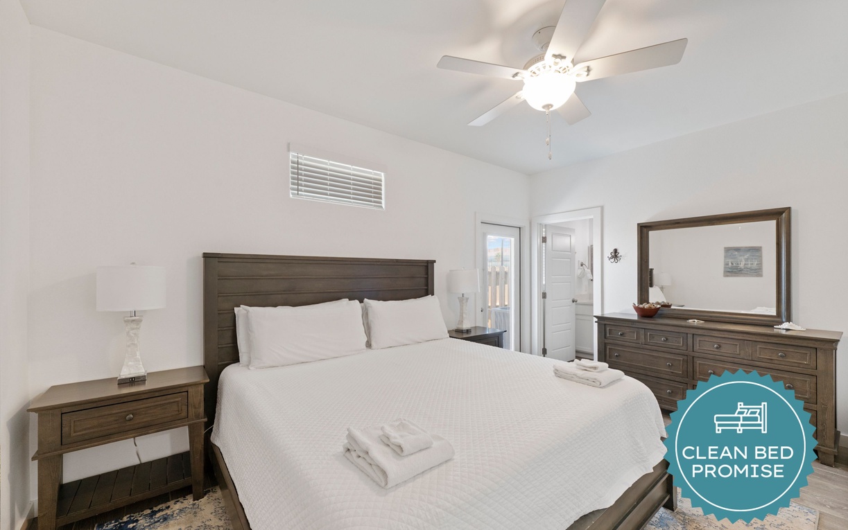 Unwind in your serene bedroom with crisp linens and peaceful ambiance for perfect rest.