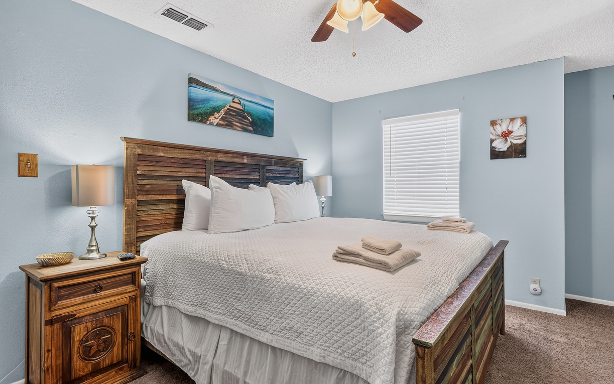 Slip into crisp white linens and let the soothing blue walls ease you into vacation mode, where your only decision is whether to nap first or explore later.