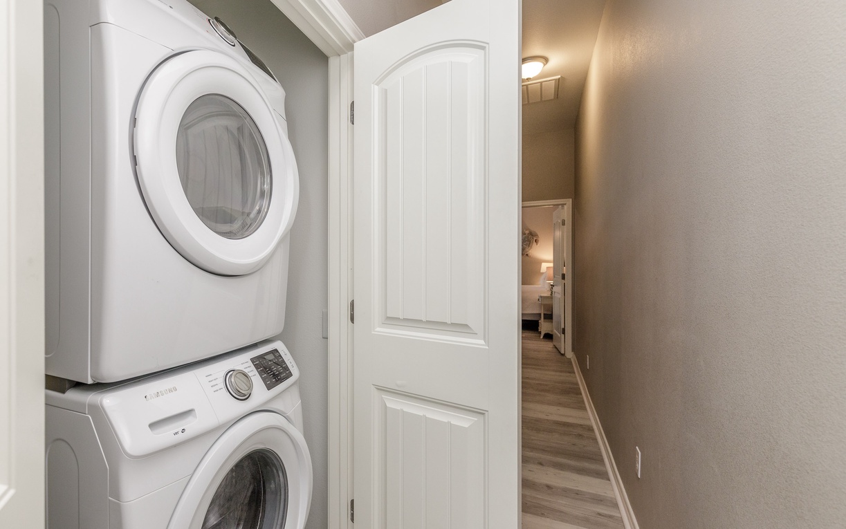 Your own washer and dryer await in this convenient hallway closet, making longer stays effortless and comfortable.