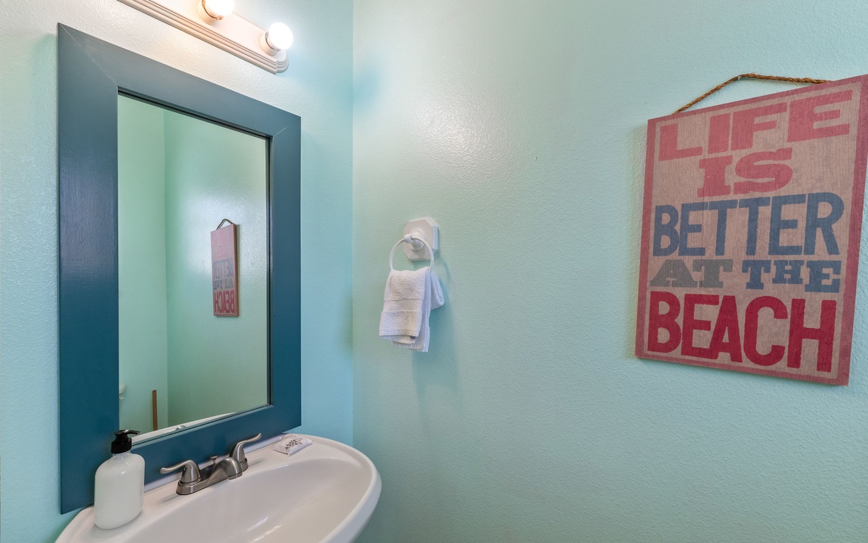 Freshen up in your bright coastal bathroom with beach-themed touches that instantly put you in vacation mode.
