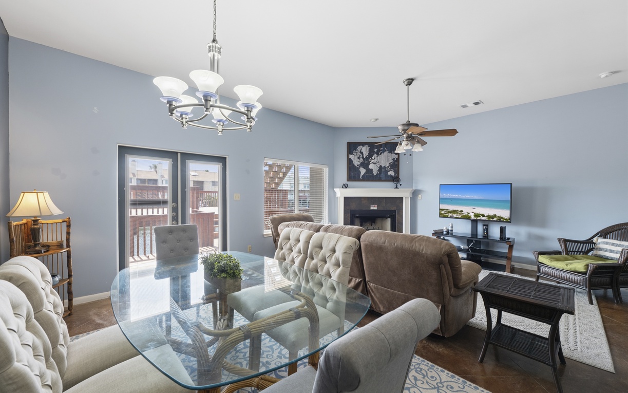 Unwind in your spacious living and dining area with elegant coastal decor, and direct balcony access to enjoy fresh air and natural light.