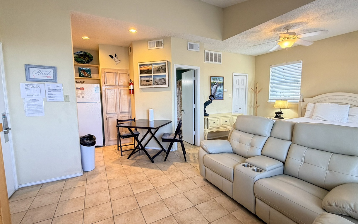 Unwind in your comfortable living space with plush seating, dining area, and thoughtful touches that make this feel like home.