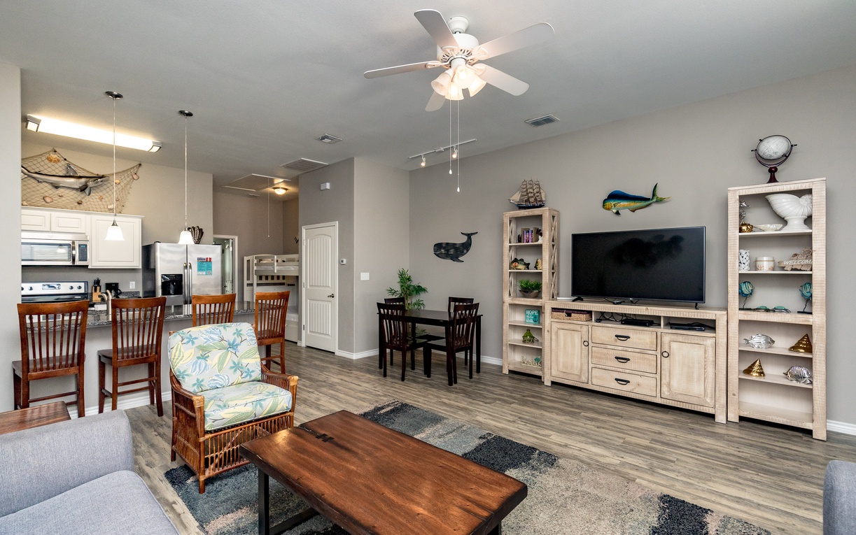 Relax in your spacious open-concept retreat featuring coastal charm, modern comforts, and nautical touches throughout your home away from home.