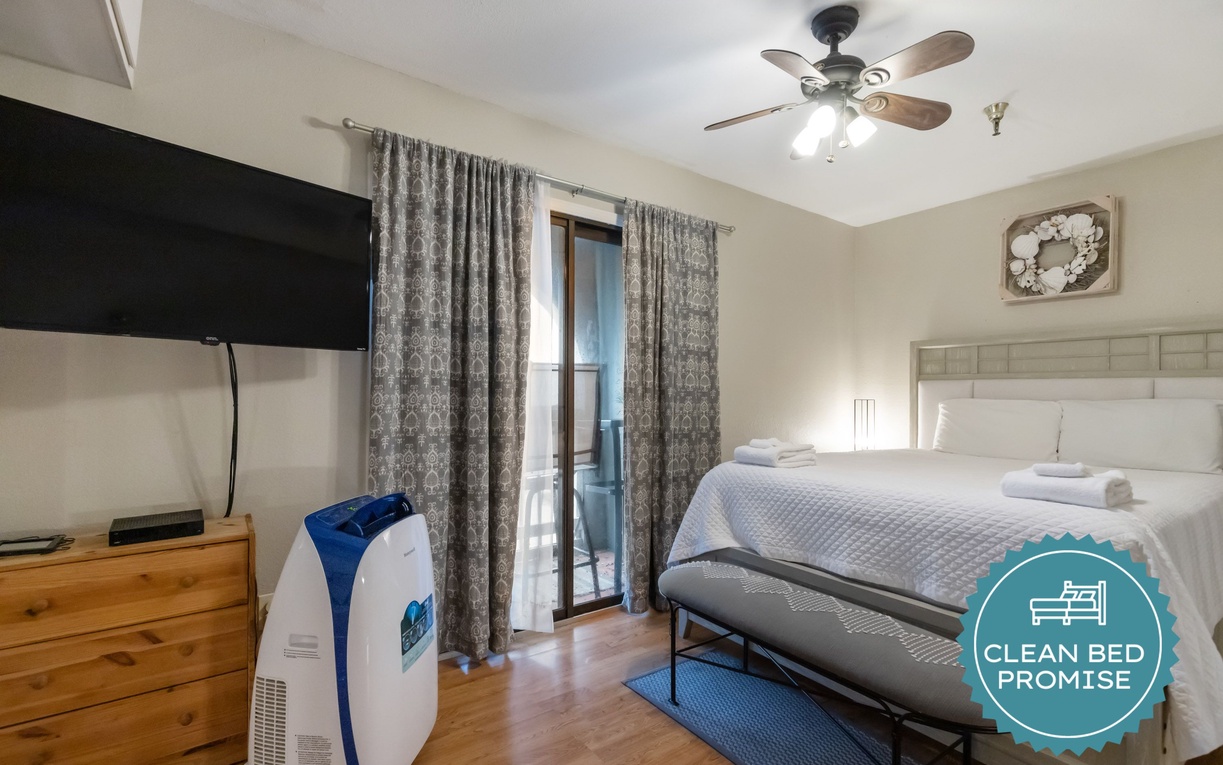 Drift off to sleep in your thoughtfully designed bedroom featuring modern comforts and fresh linens.