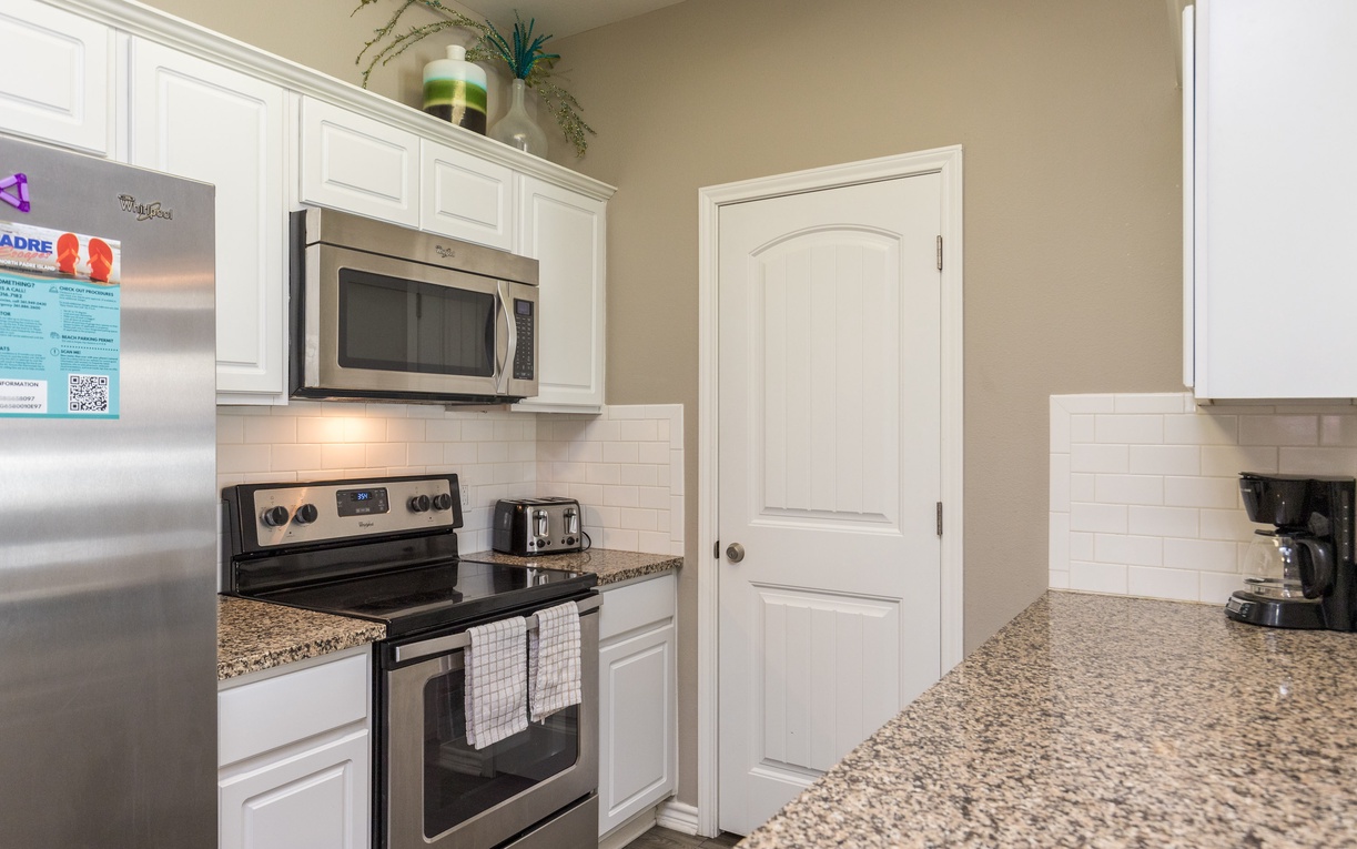 Your fully equipped kitchen features granite counters, stainless steel appliances, and everything you need to create memorable meals during your stay.