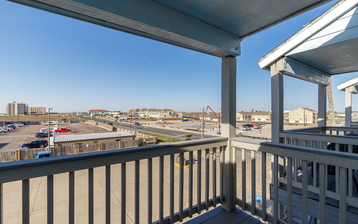 Enjoy people watching from the guest bedroom balcony
