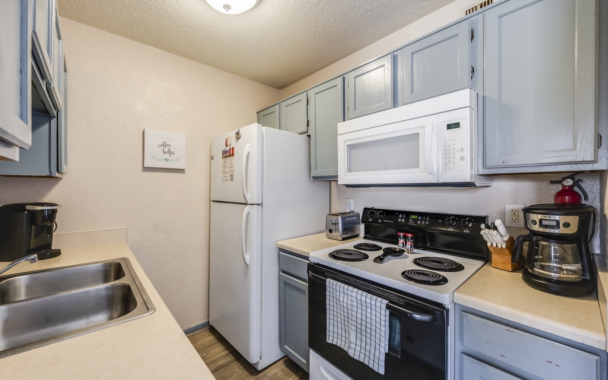 Your fully equipped kitchen awaits with everything needed to create delicious meals during your stay.