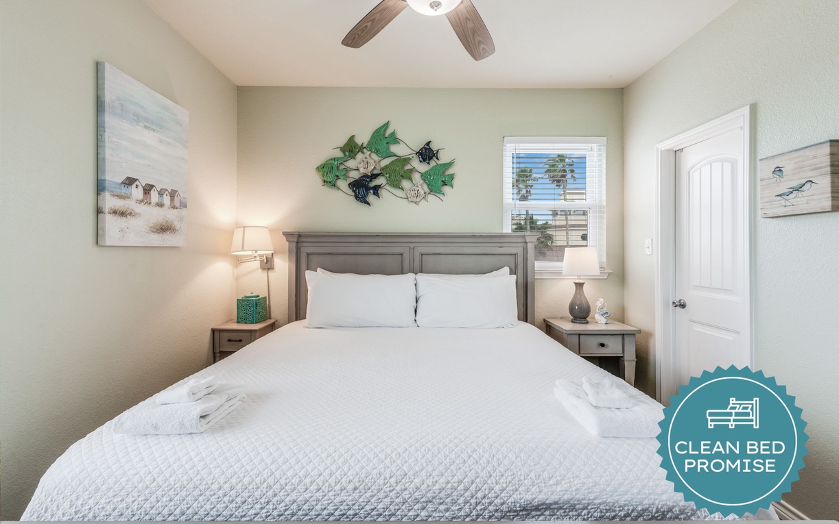 Drift into peaceful dreams in your coastal-themed bedroom, where crisp white linens and ocean-inspired artwork create a soothing sanctuary.