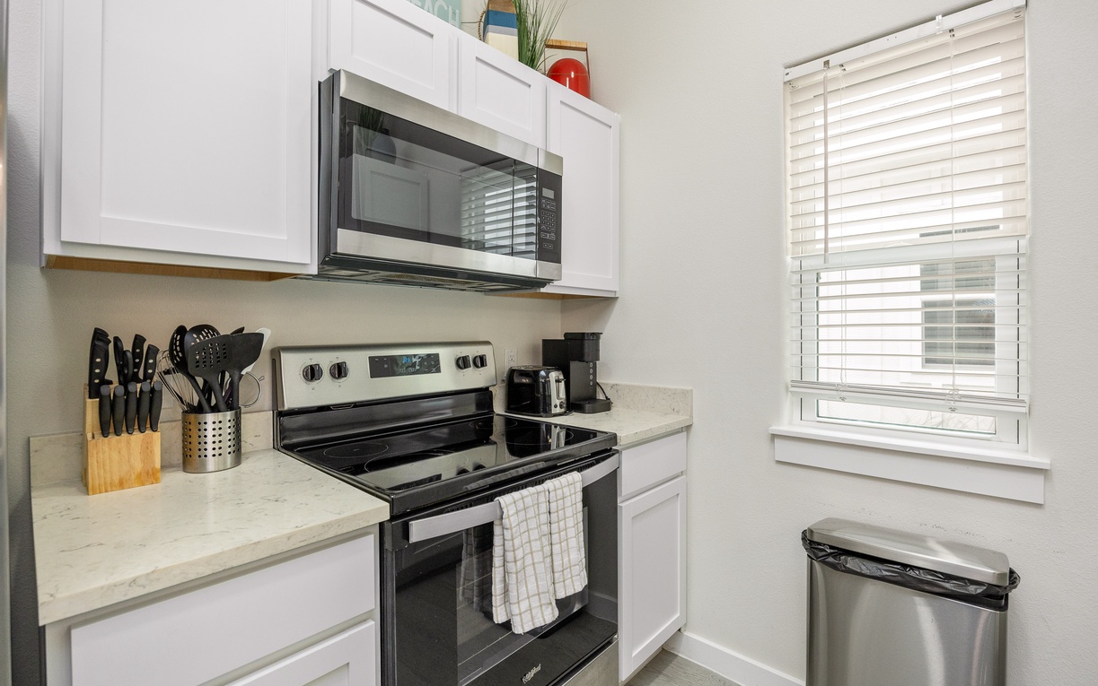 Your fully equipped kitchen awaits with modern appliances and all the essentials for home-cooked meals during your stay.