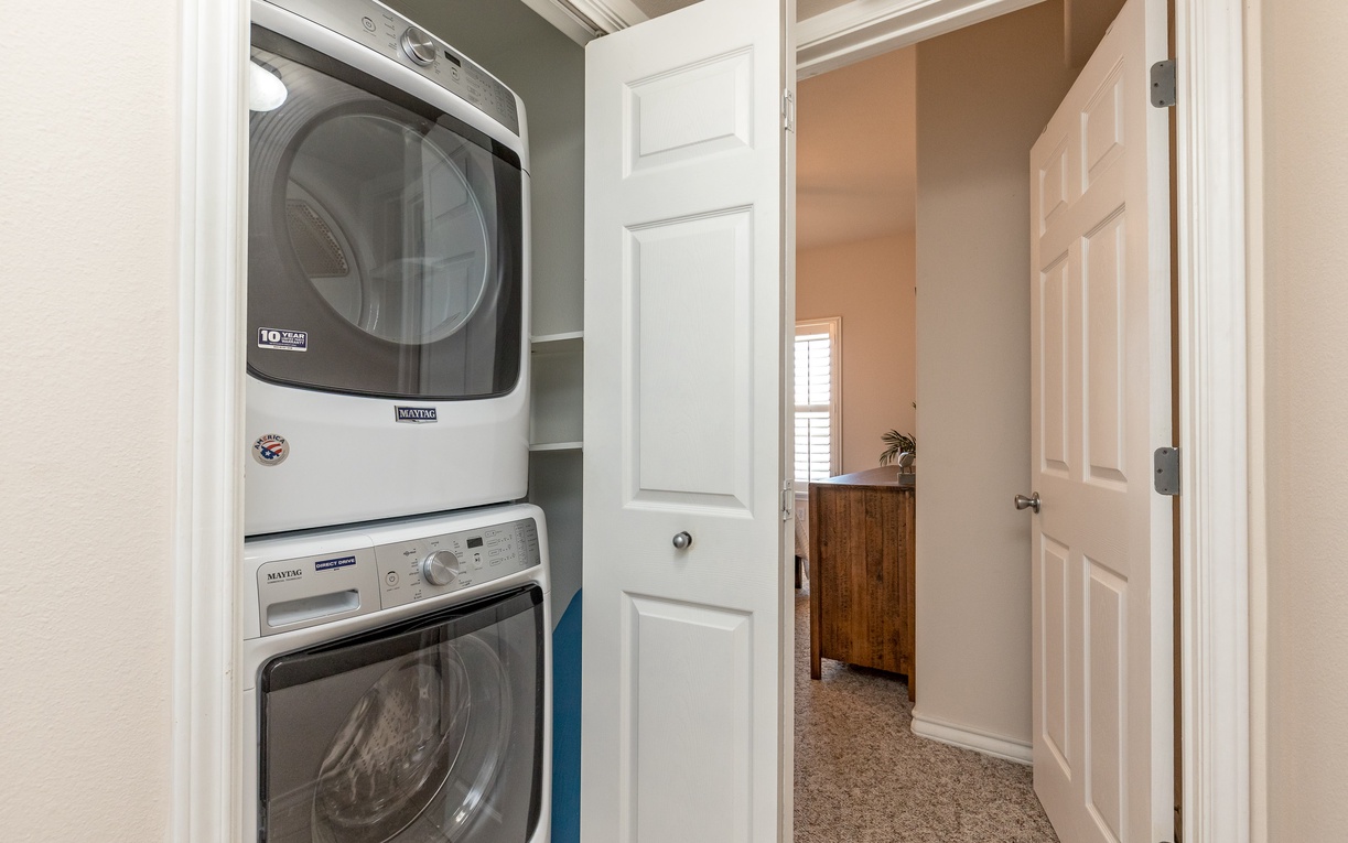 Your in-unit washer and dryer make packing light a breeze, tucked neatly in this convenient closet space.