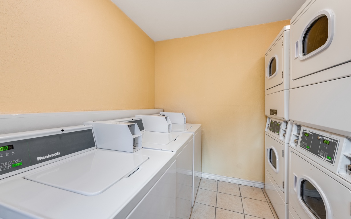 Keep your clothes fresh in this spacious laundry facility with multiple machines, making longer stays comfortable and convenient for you.