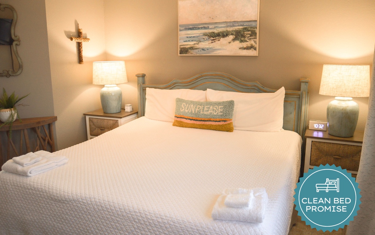 Sink into crisp white linens and coastal charm, where beach-inspired decor creates your perfect seaside retreat.