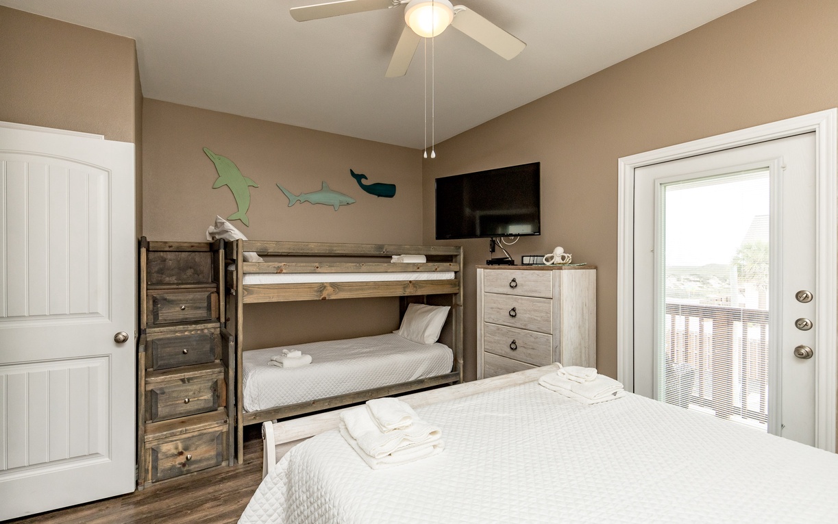 Your kids will love the charming bunk bed and marine-themed decor, while you relax knowing everyone sleeps comfortably in this thoughtfully designed room.