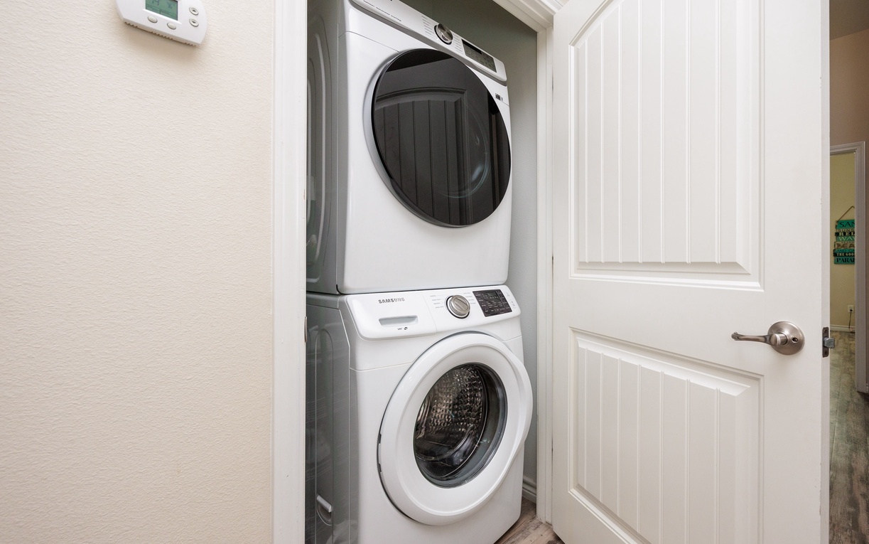 Keep your travel wardrobe fresh with your own private washer and dryer tucked into this convenient laundry closet.