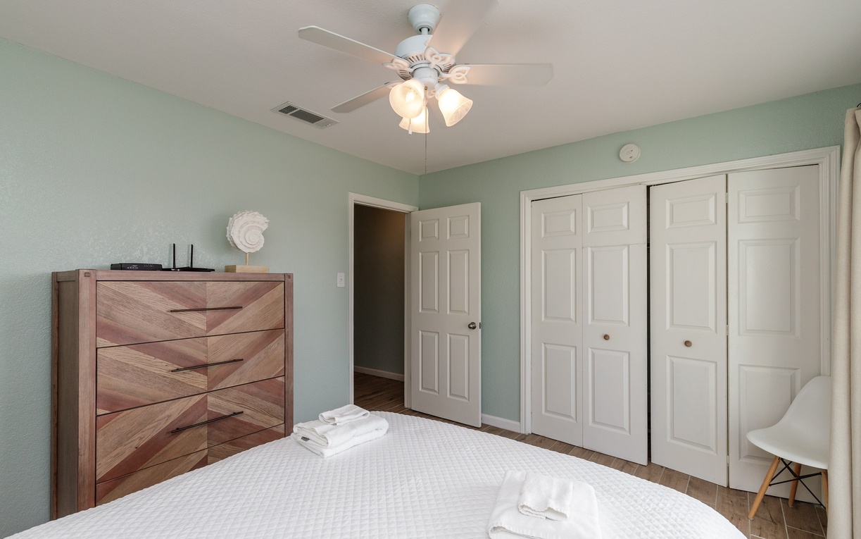 Second bedroom with queen size bed and private balcony