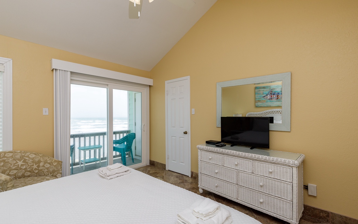 Second floor primary bedroom with king size bed.