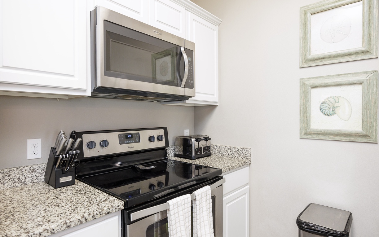 Your fully equipped kitchen features granite countertops, modern appliances, and everything you need for home-cooked meals during your stay.