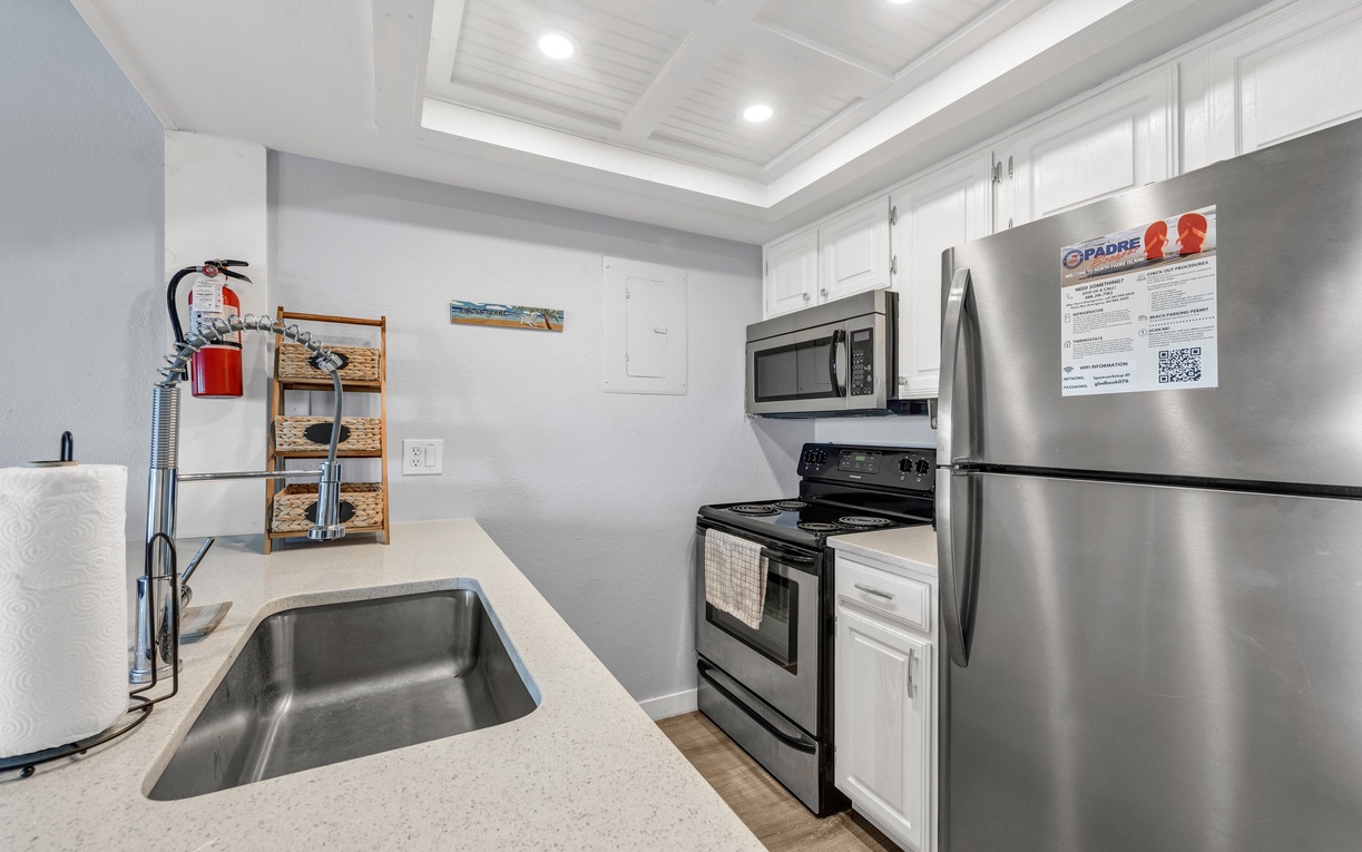 Your fully equipped modern kitchen features sleek appliances and plenty of counter space for preparing memorable vacation meals.