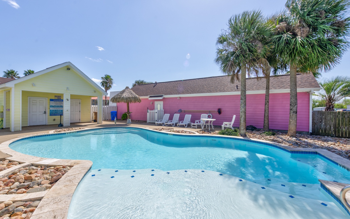 Your private pool paradise awaits with crystal-clear waters and tropical palms creating the perfect Florida getaway backdrop.