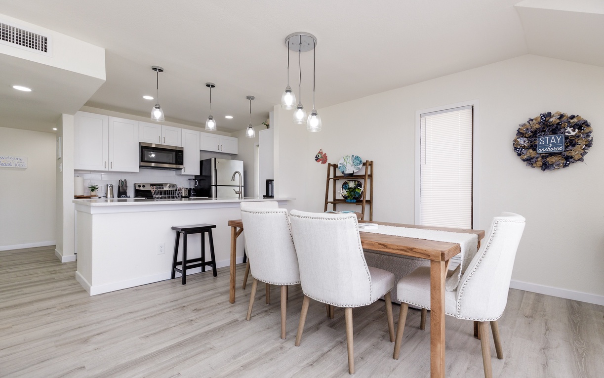 Your bright, open-concept kitchen flows seamlessly into the dining area, perfect for preparing meals and gathering with loved ones.