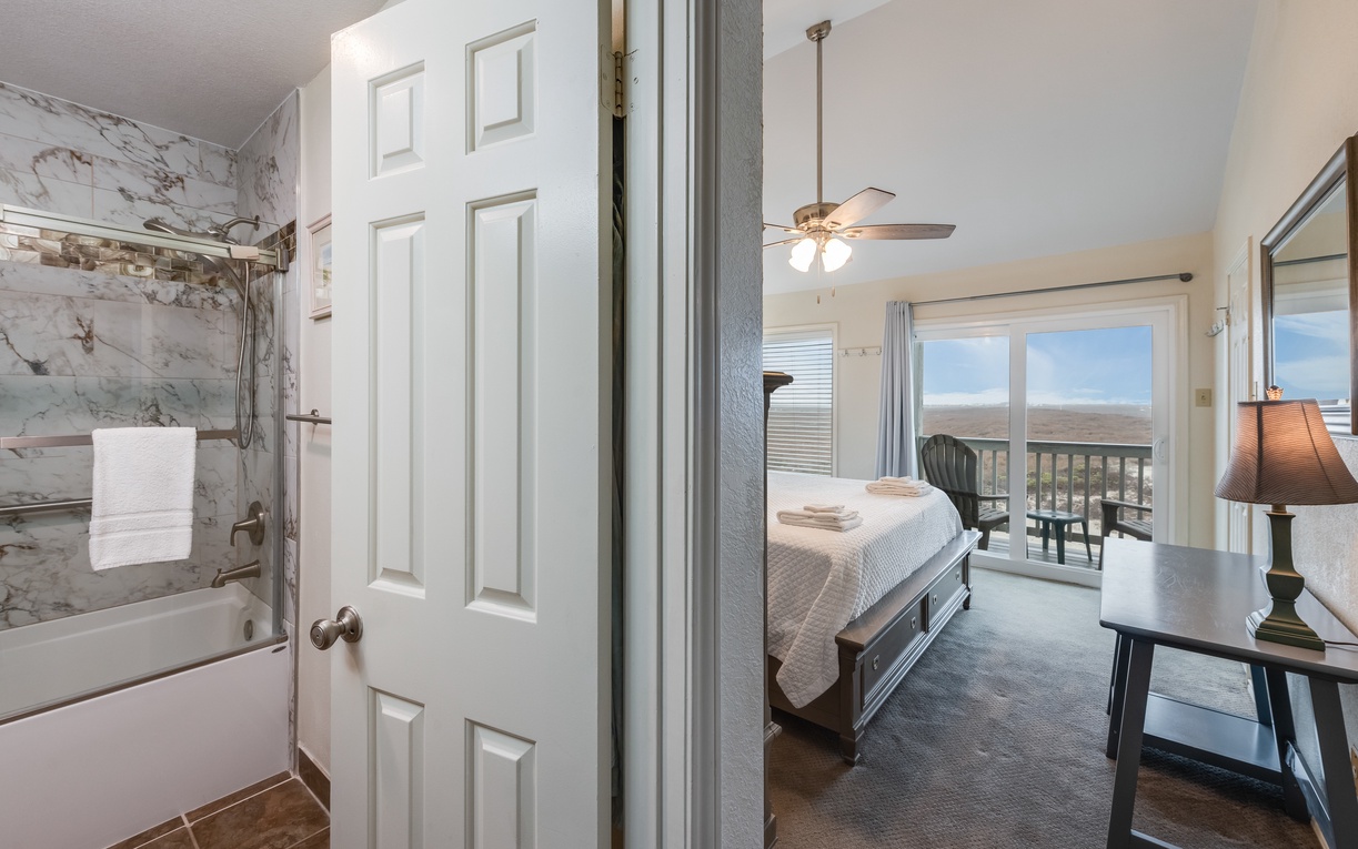 Your bright bedroom offers a peaceful retreat with stunning mountain views from your private balcony.
