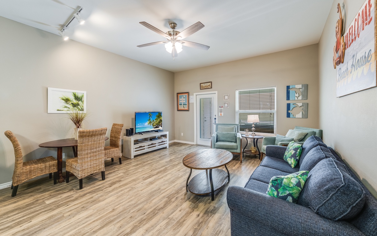 Unwind in your bright, spacious living area with coastal charm and modern comfort for memorable vacation moments.