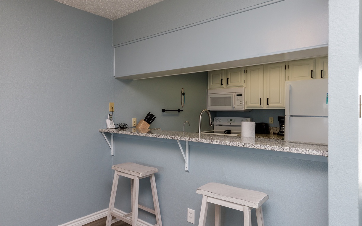Grab a morning coffee at your breakfast bar before exploring the day's adventures.