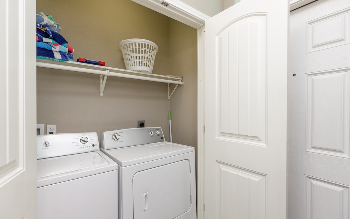Your private laundry room keeps your vacation wardrobe fresh with a full-size washer and dryer, plus convenient shelving for supplies.