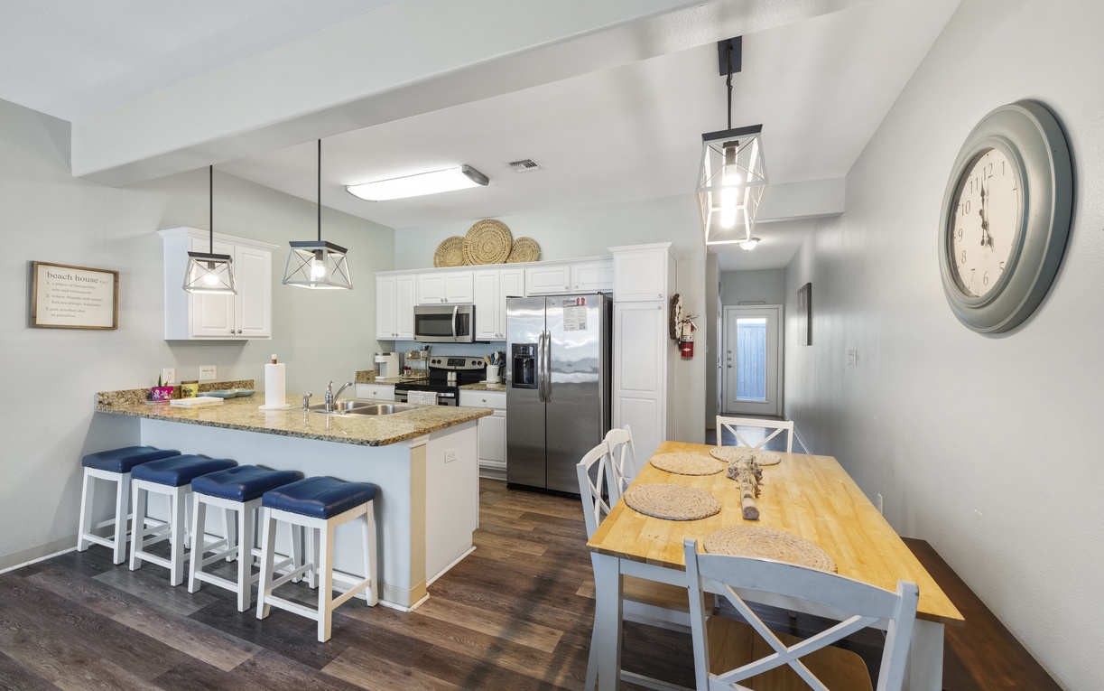 Your spacious kitchen welcomes you with granite counters, modern appliances, and a cozy breakfast nook perfect for morning coffee and meal prep.