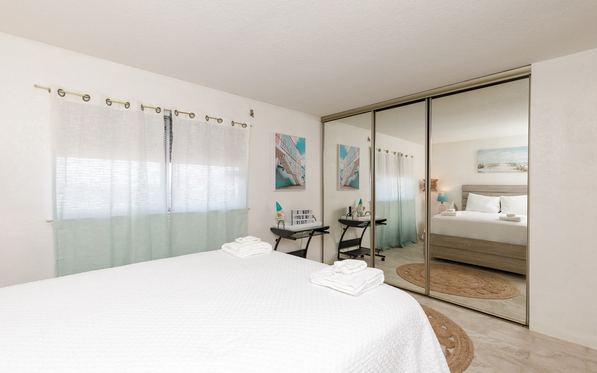 Sink into the king size bed in your peaceful bedroom, where mirrored wardrobes create spacious elegance and soft natural light invites restful mornings.