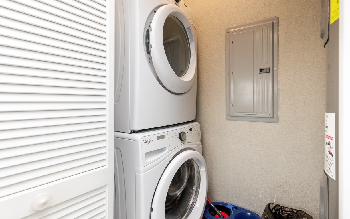Your dedicated laundry space features a stacked washer and dryer for convenient in-unit washing and drying during your stay.
